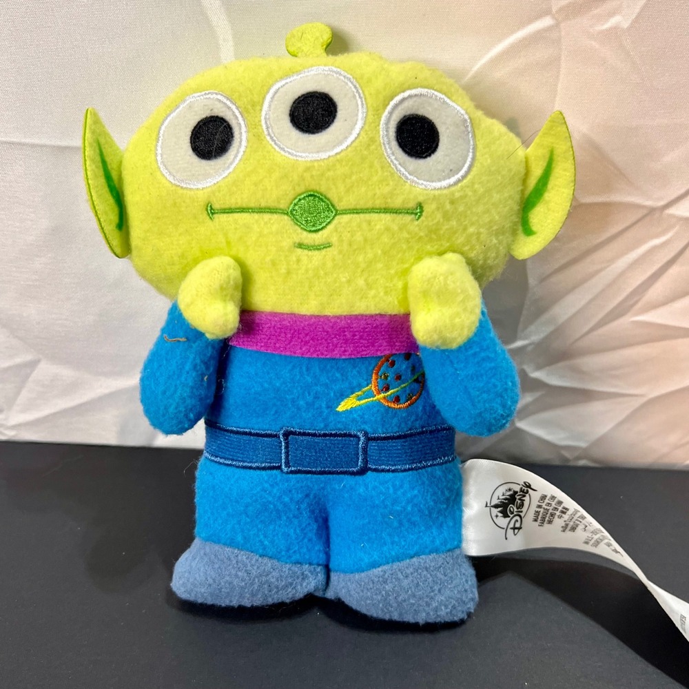 Disney Green Three-Eyed Alien Plush with Blue Outfit and Purple Collar